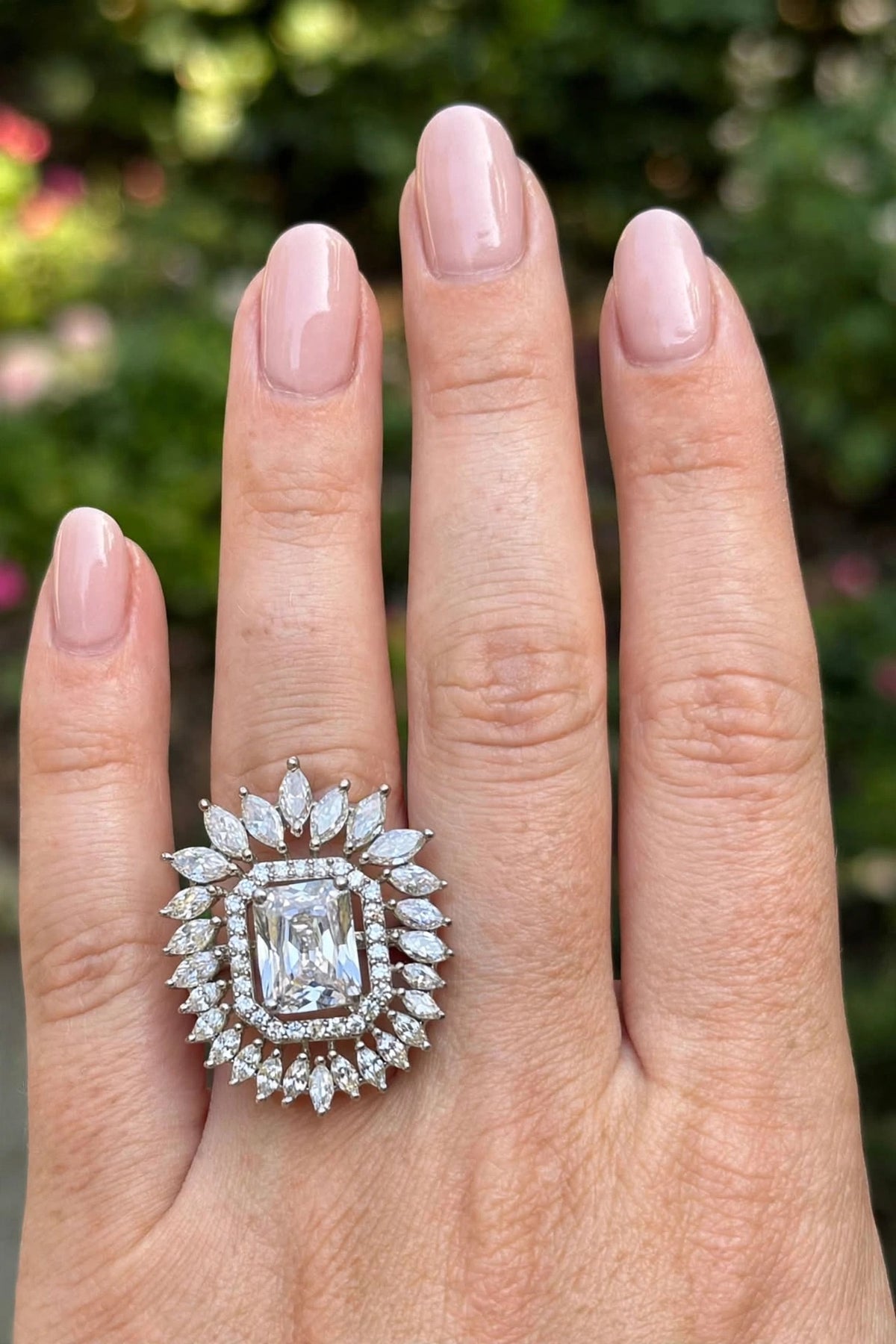 Emerald-Cut Sunburst Halo Celebrity Ring