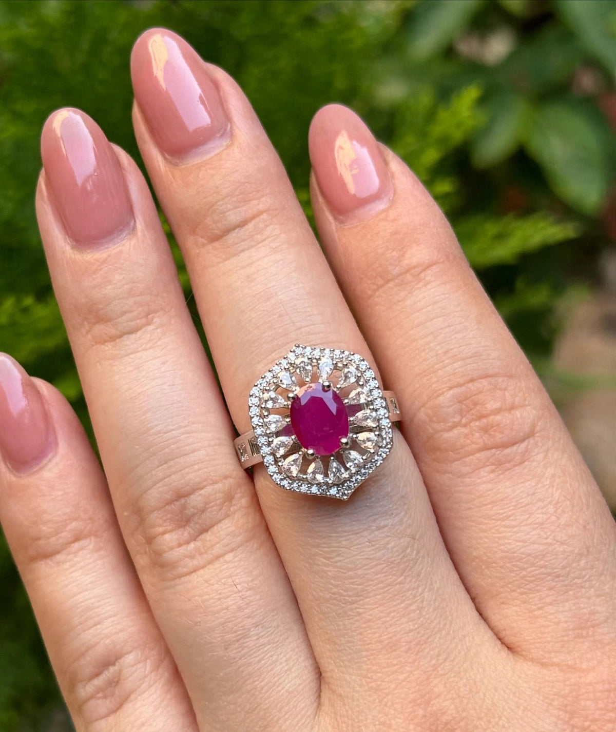Ruby Oval Sunburst Halo Ring