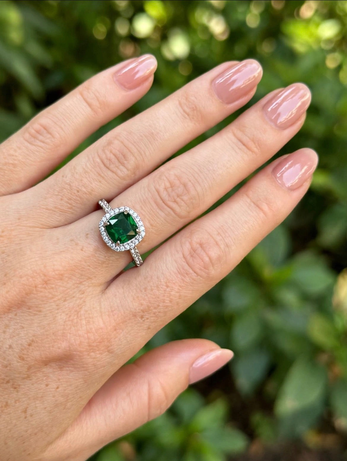 Emerald Cushion Halo Solitaire Ring
